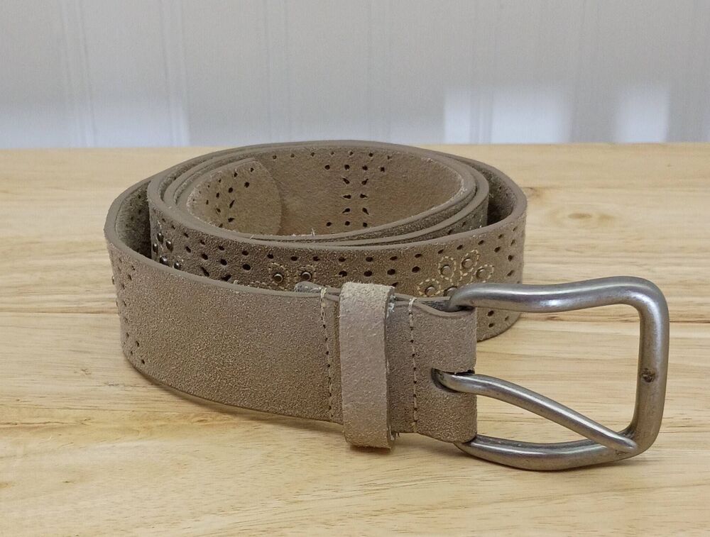 Beige ornate leather like belt. 45 in